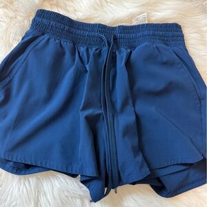 YPB motionTEK High Rise Lined Workout Shorts in Midnight Navy